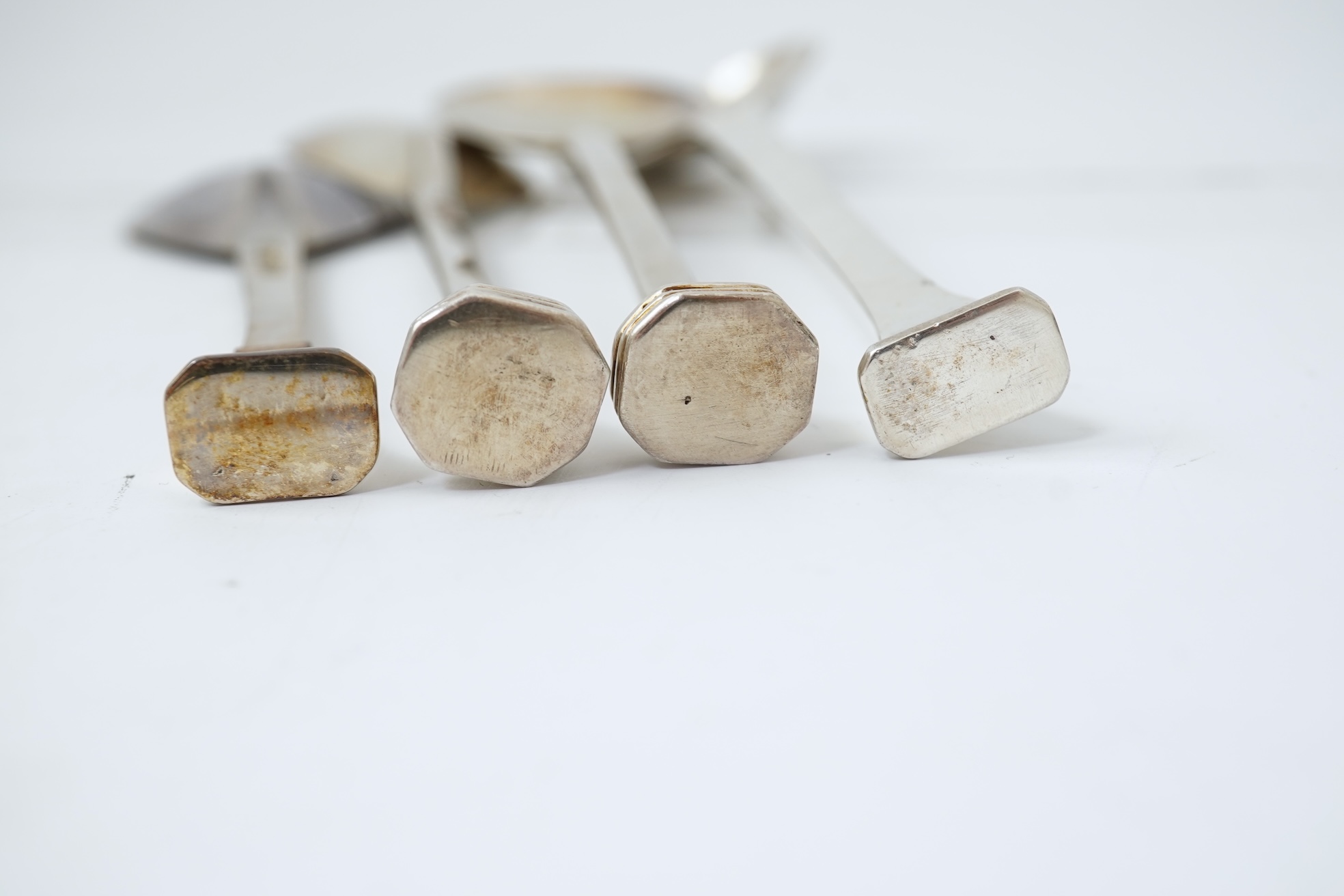 A pair of Elizabeth II silver 'seal top' spoons by The Guild of Handicrafts, London, 1990, 16cm, together with a similar later spoon, London, 2008 and a similar preserve spoon, London, 2003, two with boxes.